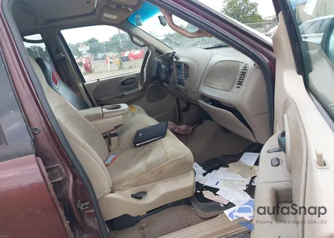 2001 Ford F-150 King Ranch Edition/Lariat/Xlt z USA, uszkodzony, nr VIN 1FTRW08L31KD86312